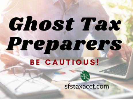 faded out image of man at laptop -Ghost Tax Preparers -