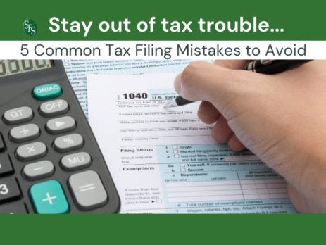 Hand filling out 104-Stay Out of Tax Trouble By Avoiding These 5 Common Tax Filing Mistakes