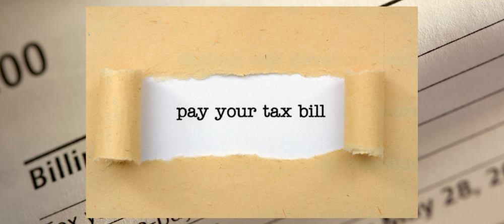 tax reurn and text that says- pay your tax bill