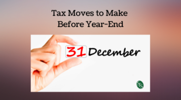 Tax Moves to Make Before Year-End with hand holding cube saying 31 for taxable income