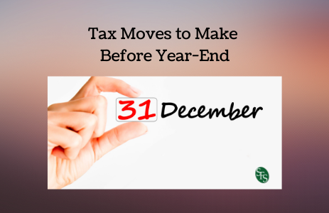 Tax Moves to Make Before Year-End with hand holding cube saying 31 for taxable income